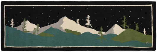 area rug featuring mountain peaks and trees 